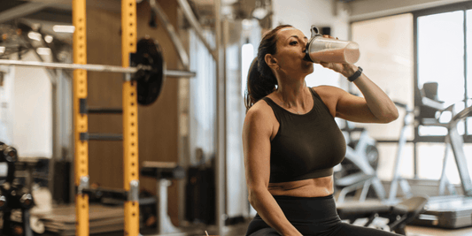 it individual pre-workout shake in gym setting; supplements illustrating creatine, beta-alanine, l‑citrulline, and caffeine represented on right side.